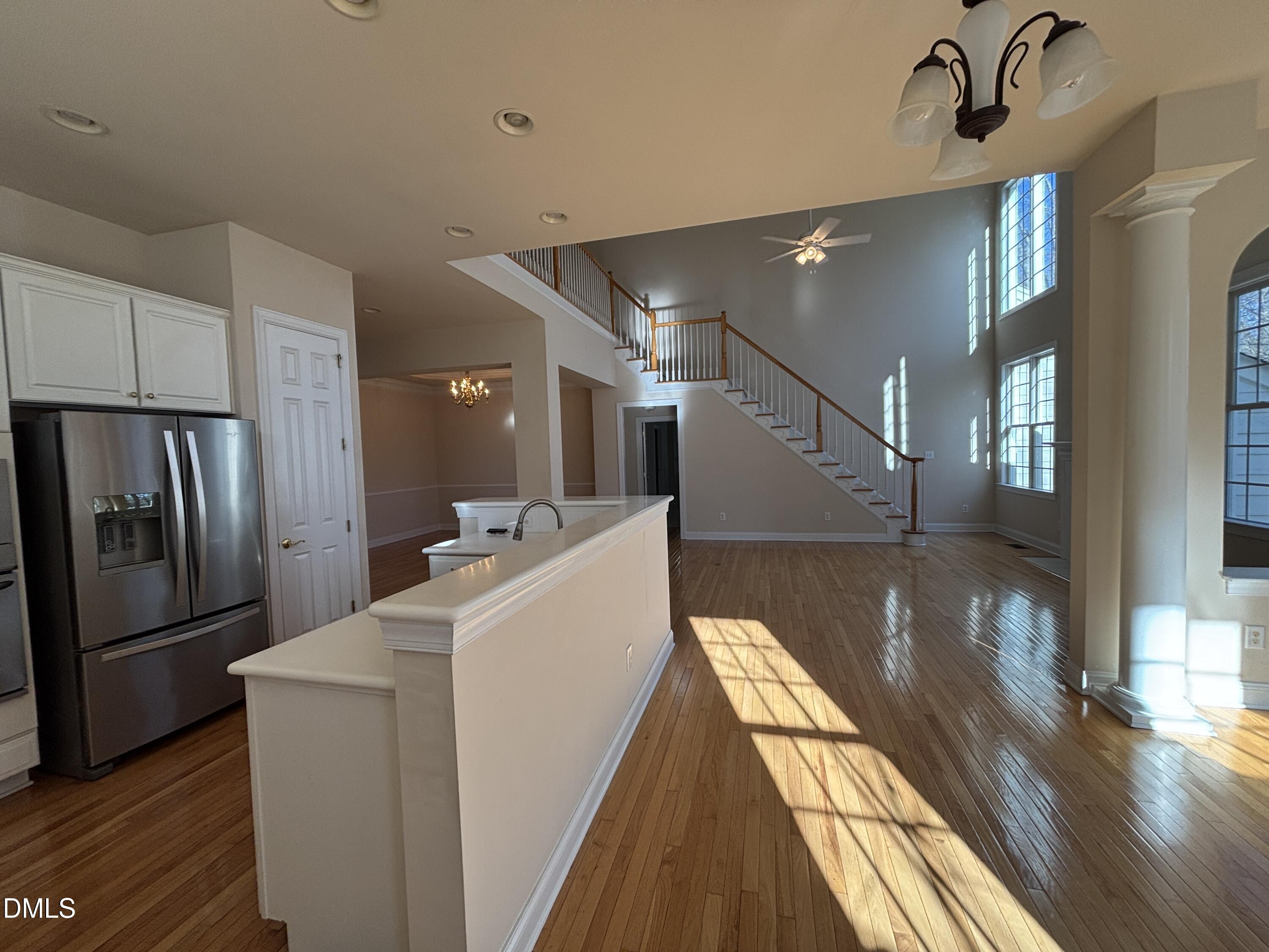 11729 Broadfield Court Raleigh, NC 27617 - Photo 15 of 47 a view of a kitchen with a sink and refrigerator