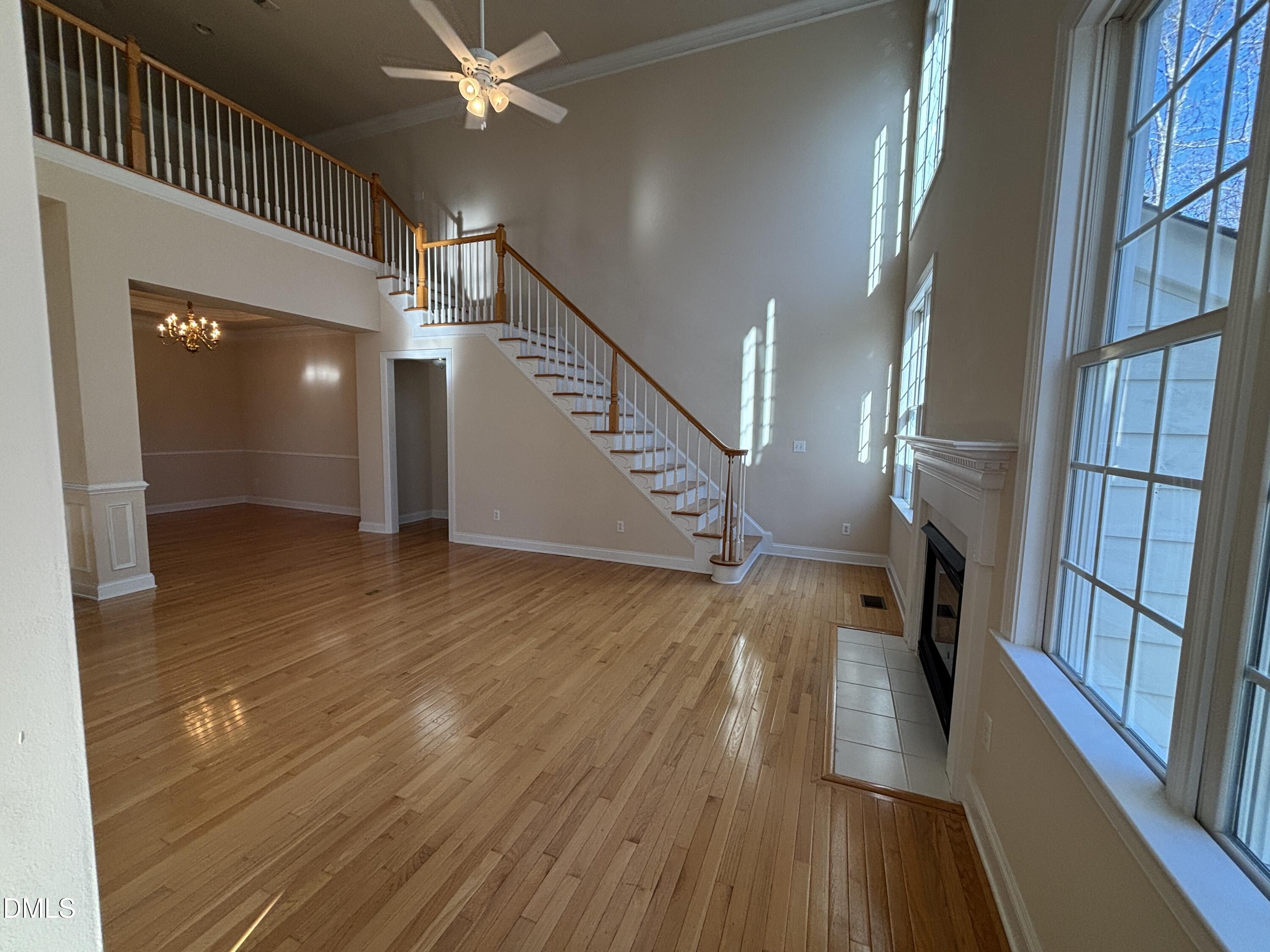 11729 Broadfield Court Raleigh, NC 27617 - Photo 17 of 47 a view of entryway and hall with wooden floor