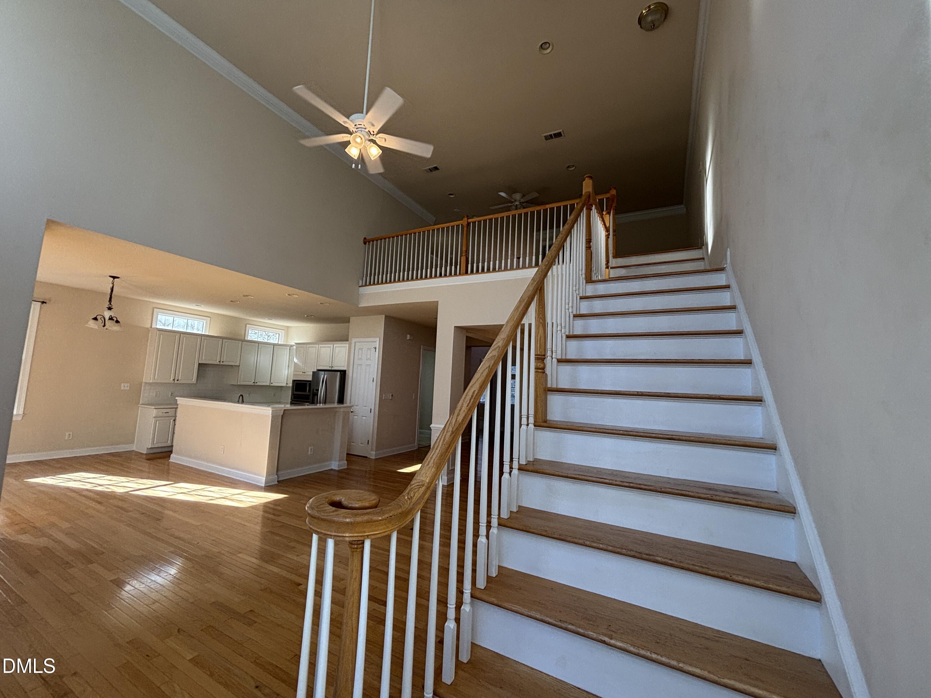 11729 Broadfield Court Raleigh, NC 27617 - Photo 25 of 47 a view of entryway and hall with wooden floor