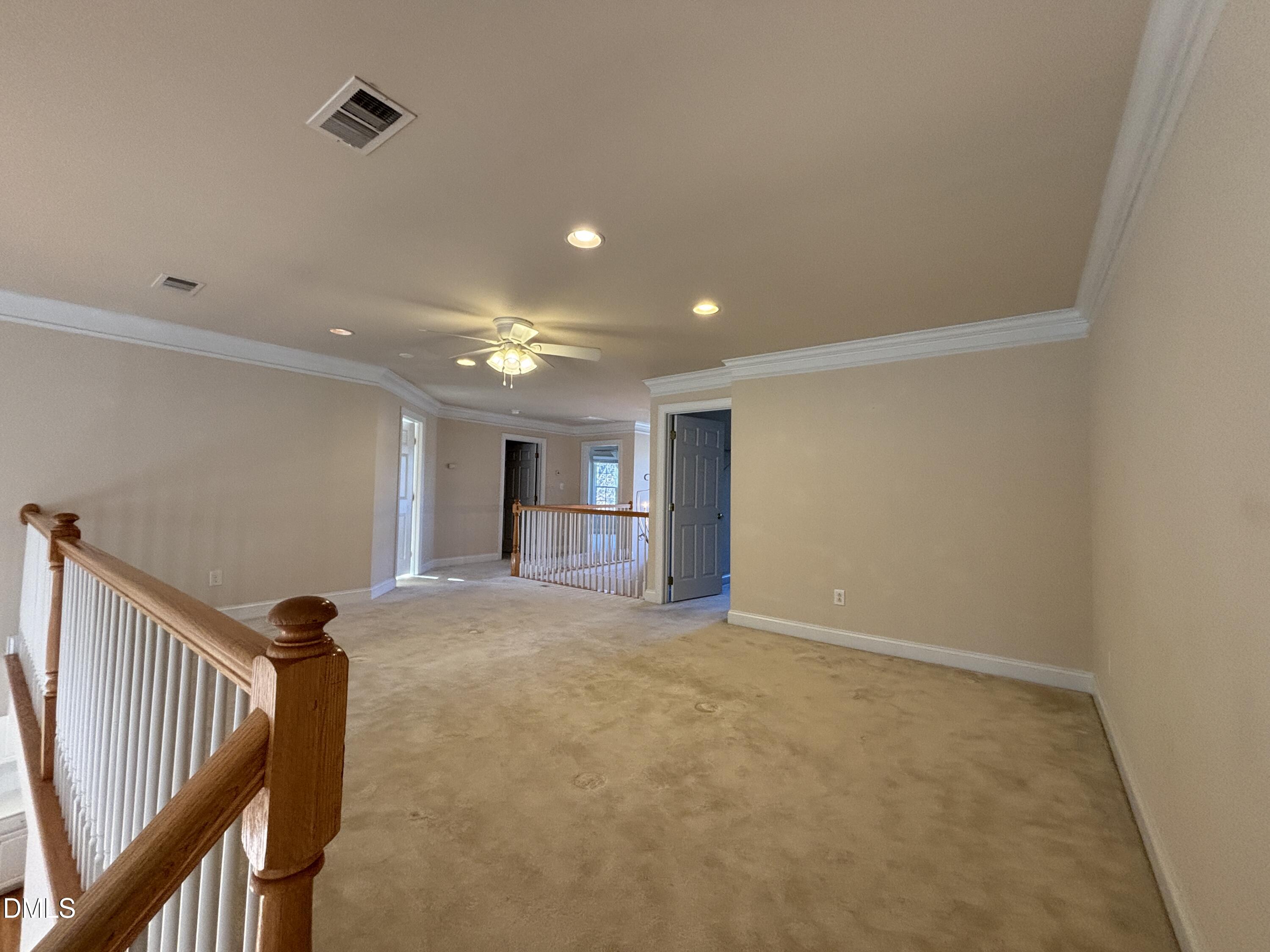 11729 Broadfield Court Raleigh, NC 27617 - Photo 27 of 47 a view of a livingroom with a staircase