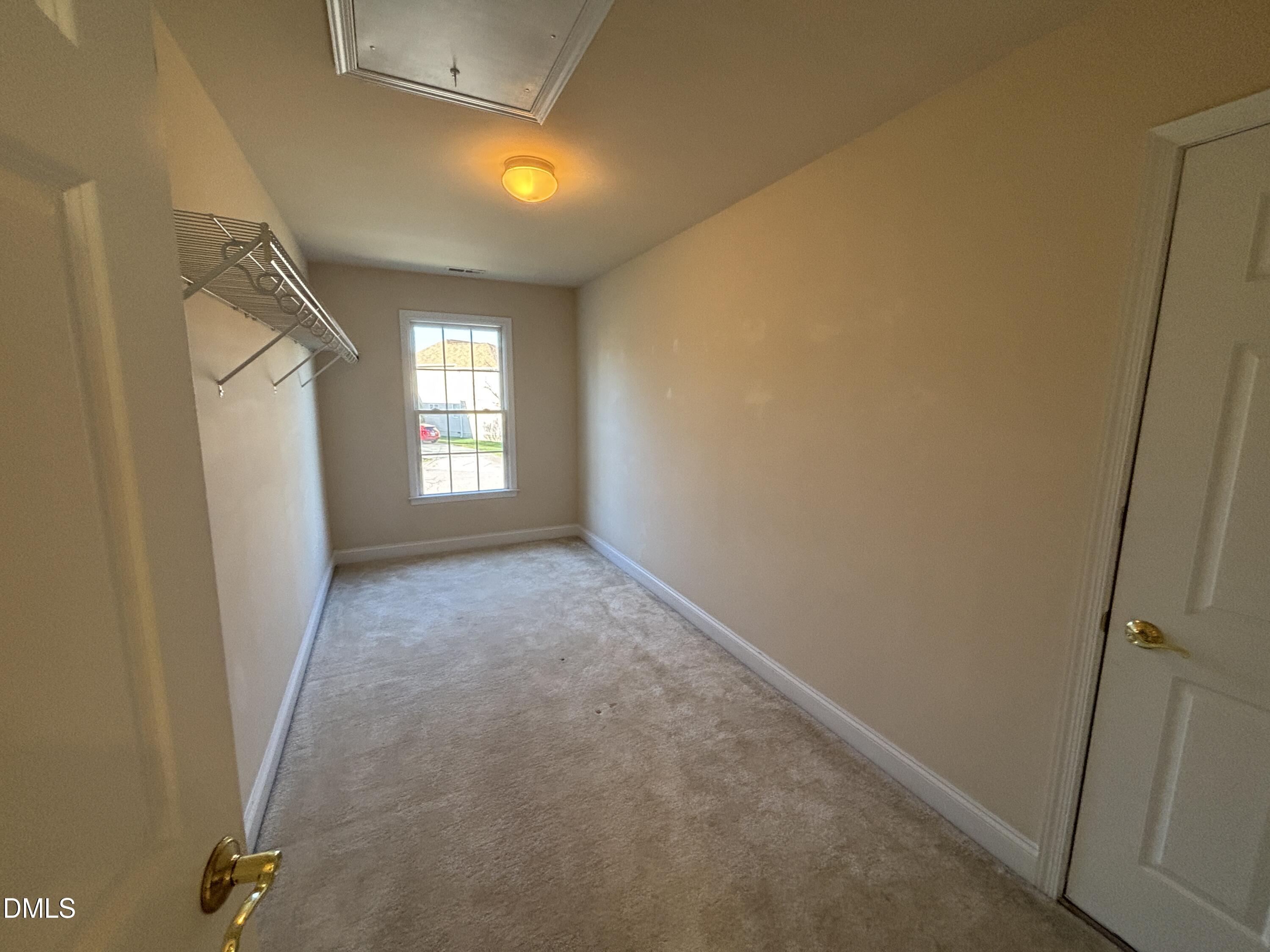 11729 Broadfield Court Raleigh, NC 27617 - Photo 29 of 47 a view of empty room with windows
