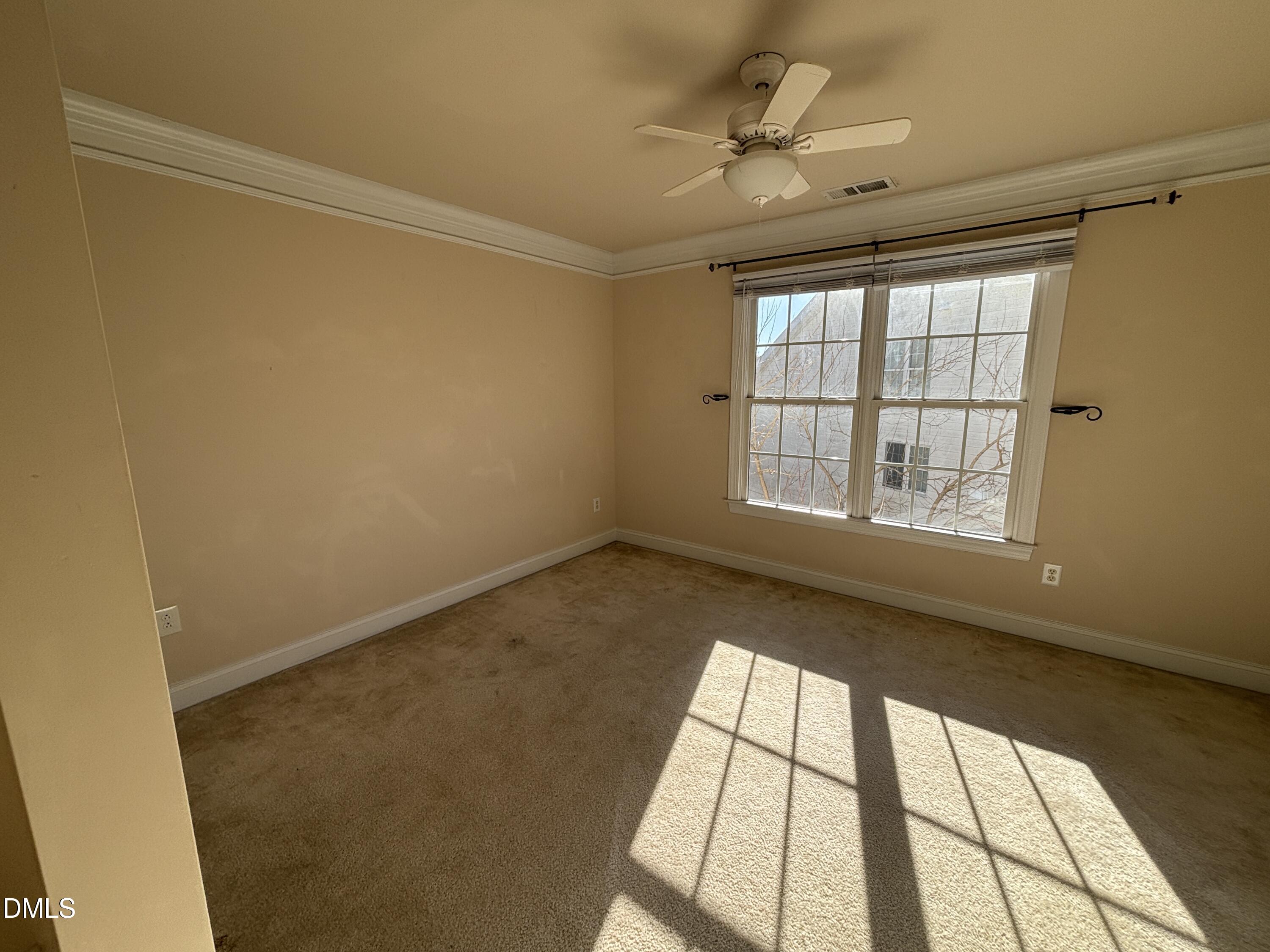 11729 Broadfield Court Raleigh, NC 27617 - Photo 31 of 47 a view of an empty room and window