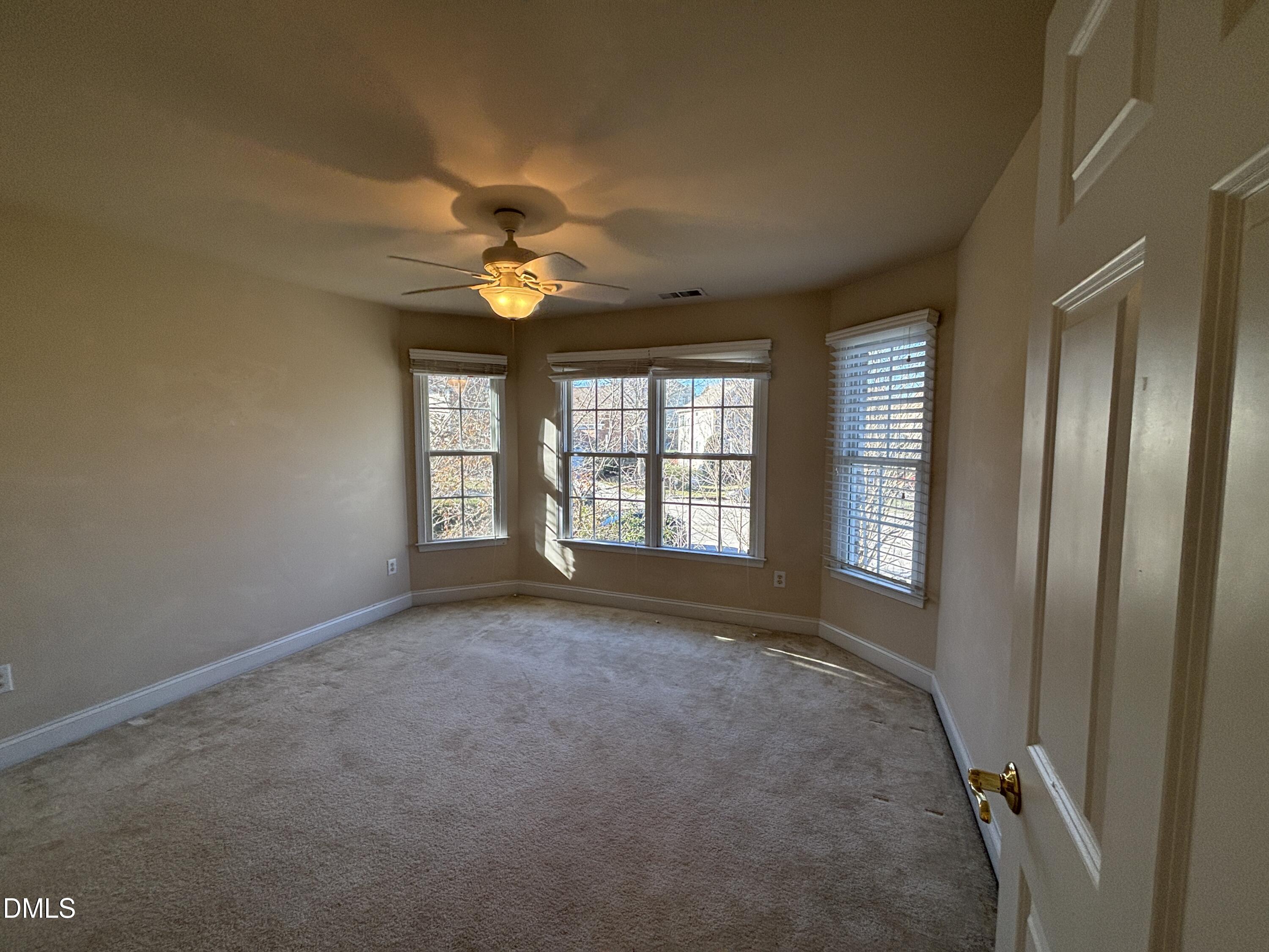 11729 Broadfield Court Raleigh, NC 27617 - Photo 34 of 47 a view of an empty room with a window