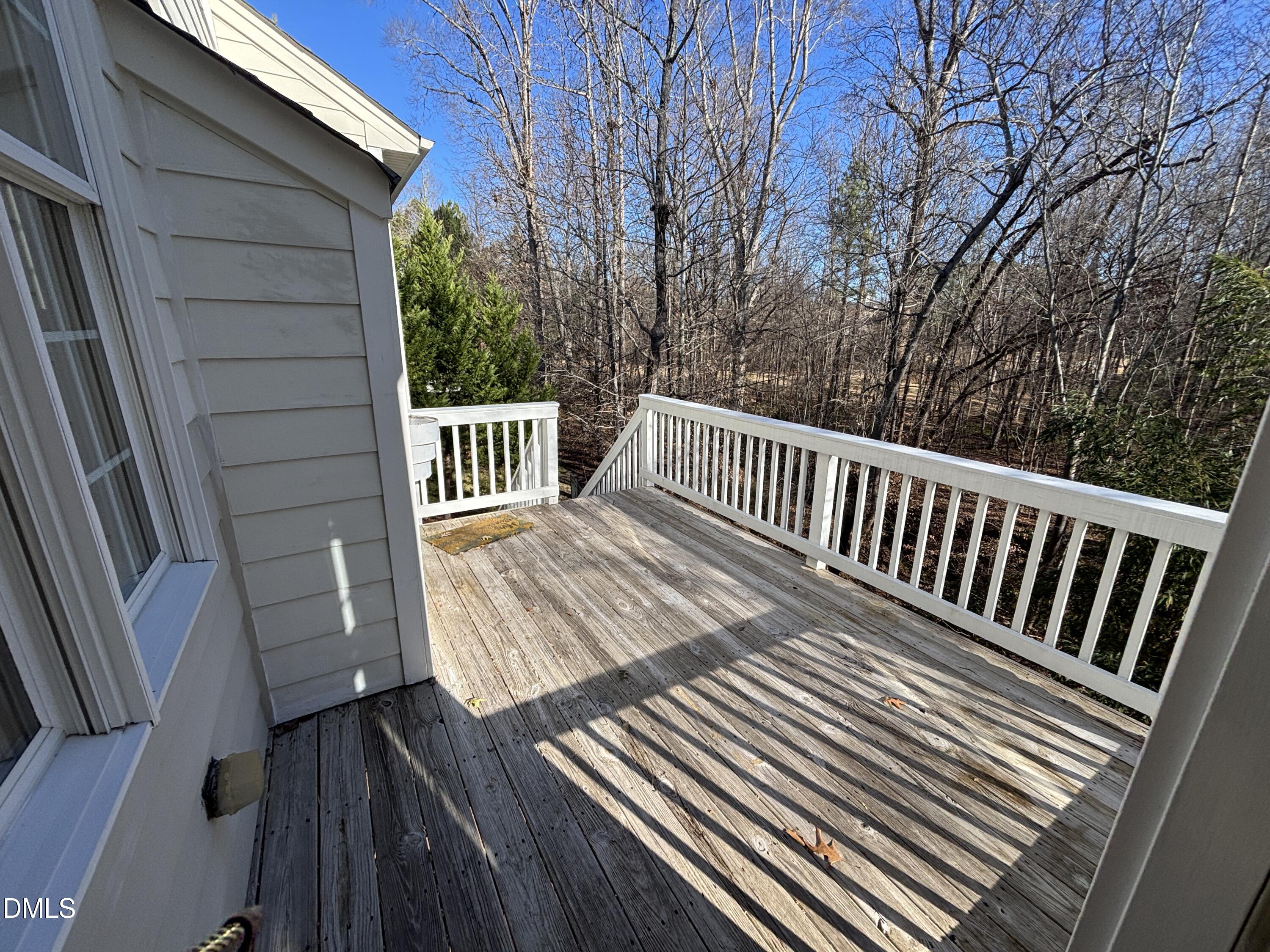 11729 Broadfield Court Raleigh, NC 27617 - Photo 42 of 47 a view of balcony with wooden floor