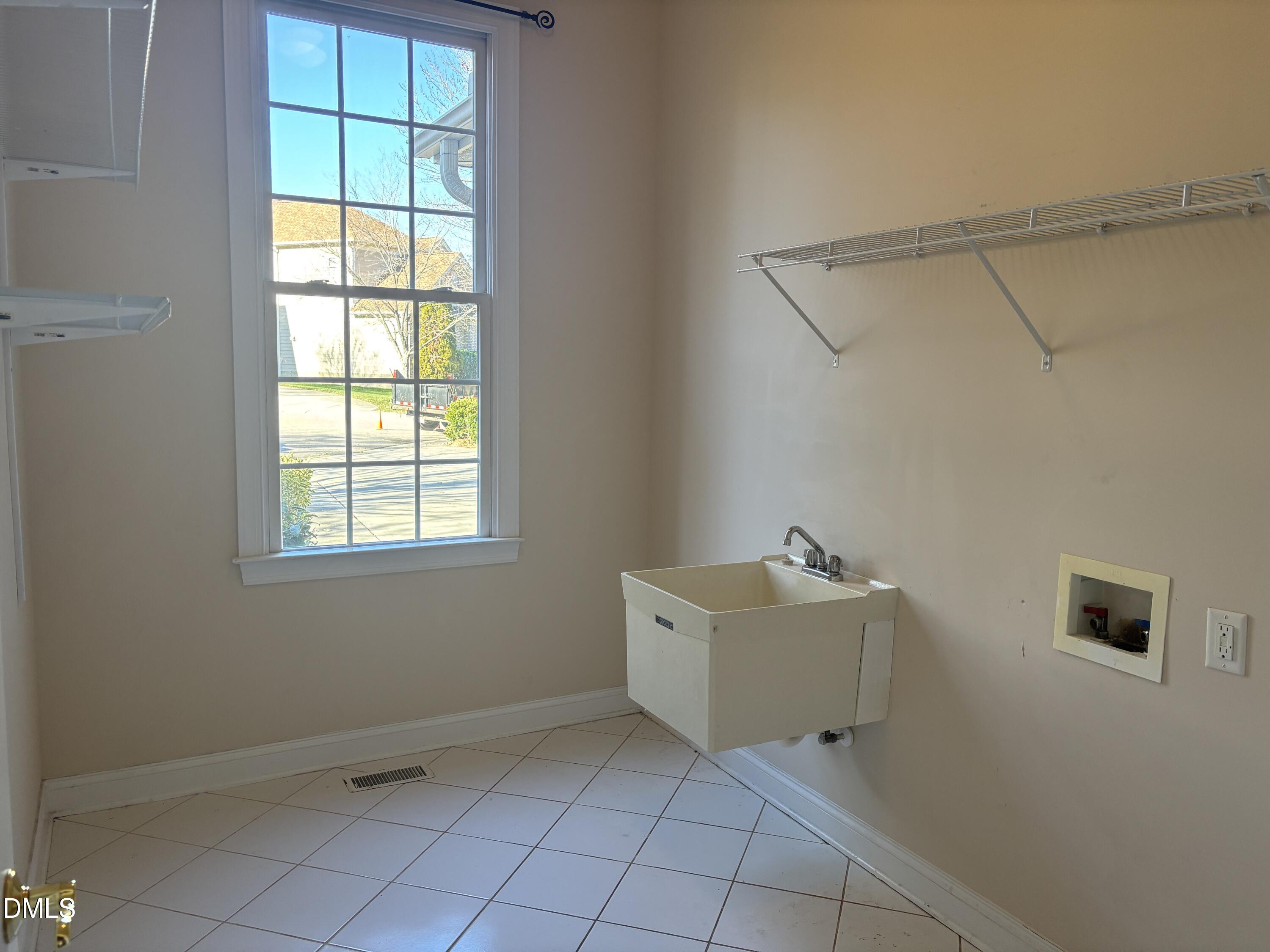 11729 Broadfield Court Raleigh, NC 27617 - Photo 8 of 47 an empty room with a window