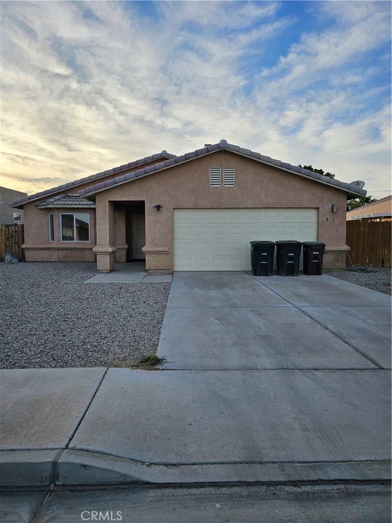 781 Aurora Way Blythe, CA 92225 - Photo 1 of 6 a front view of house with yard