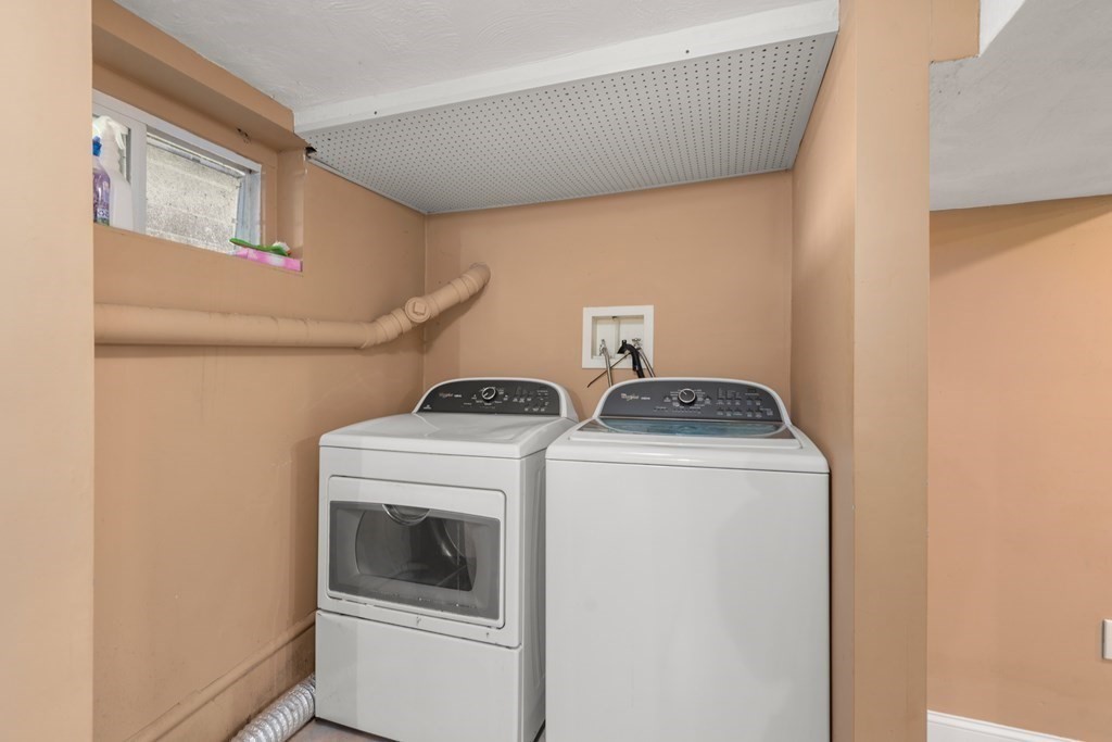 27 Upland Road Brockton, MA 02301 - Photo 20 of 25 a utility room with dryer and washer
