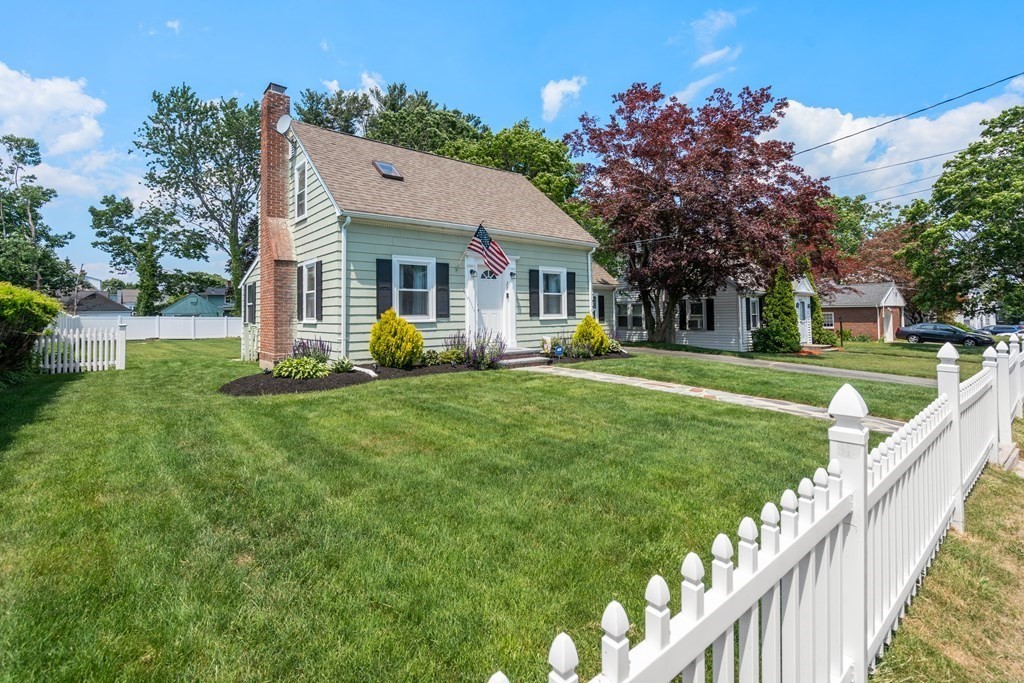 27 Upland Road Brockton, MA 02301 - Photo 2 of 25 a front view of house with yard and green space