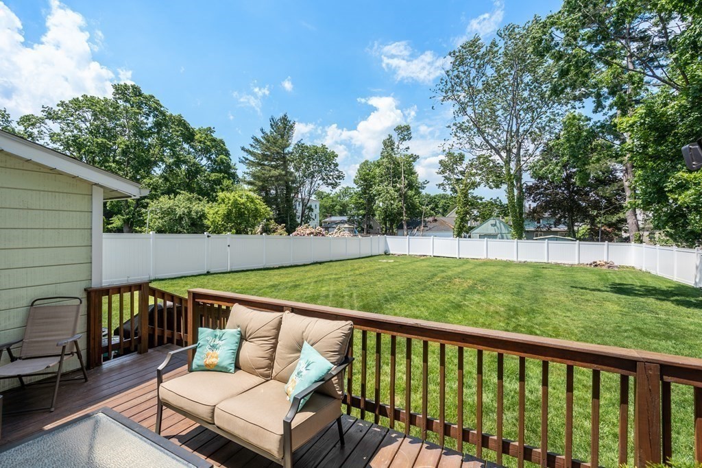 27 Upland Road Brockton, MA 02301 - Photo 22 of 25 a view of a two chairs in the deck