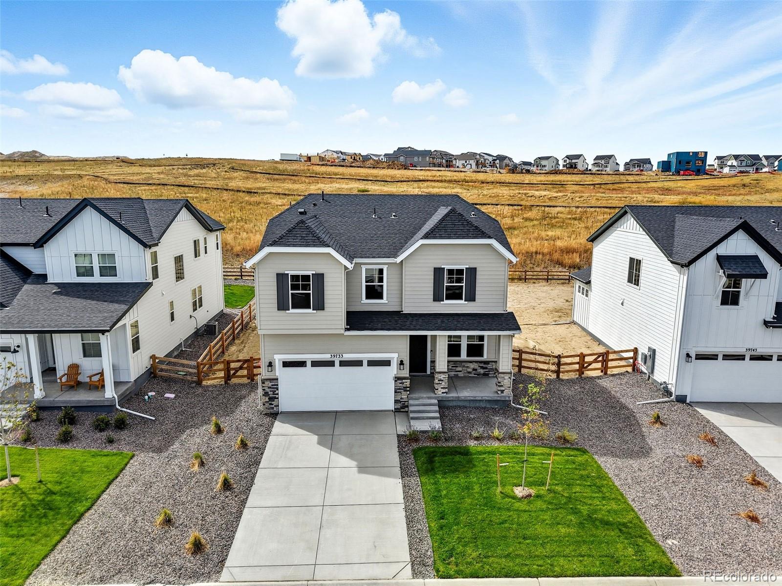 a view of house and outdoor space with swimming pool