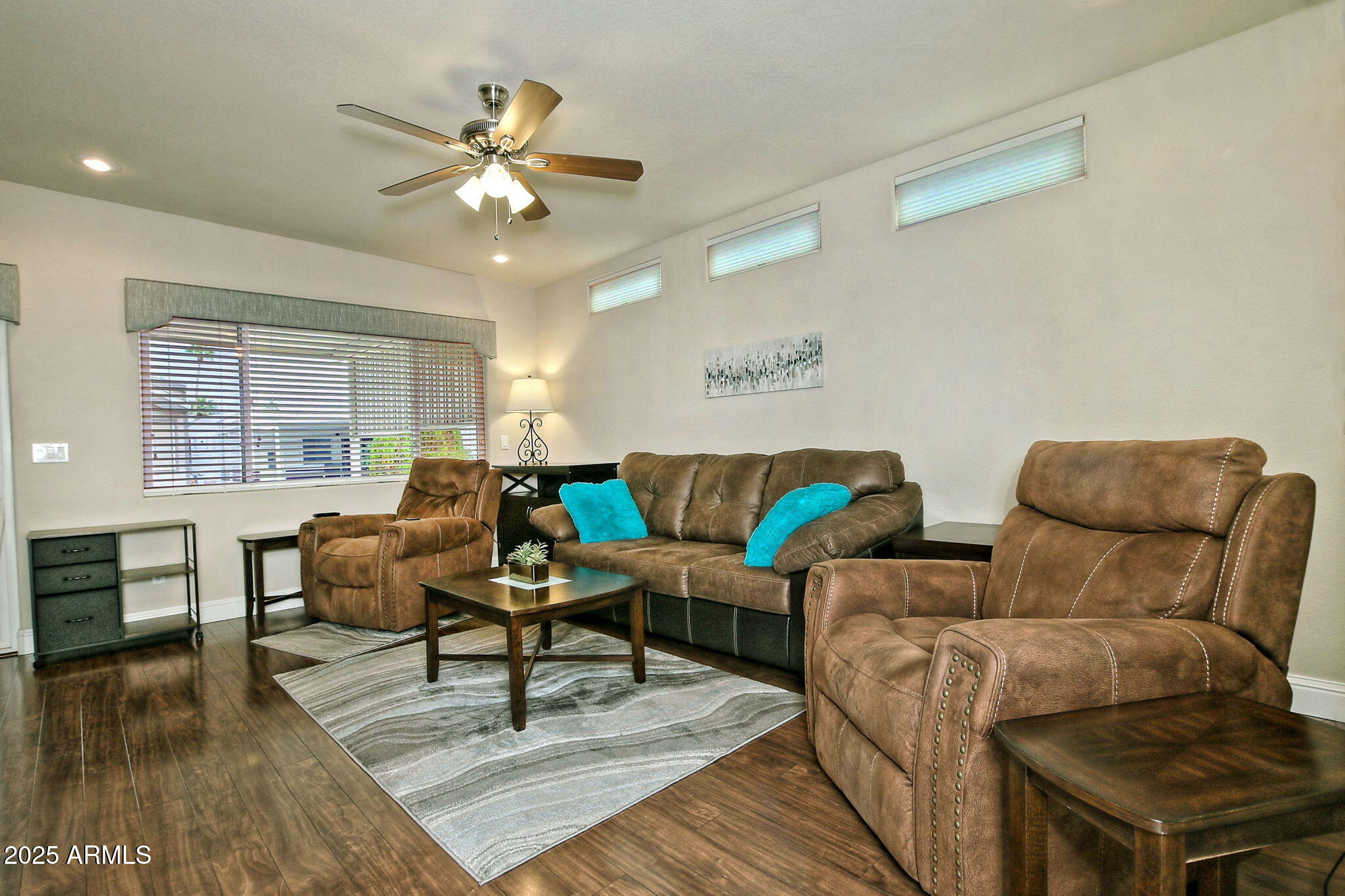111 South Greenfield Road, Unit 462 Mesa, AZ 85206 - Photo 10 of 34 a living room with furniture and a large window