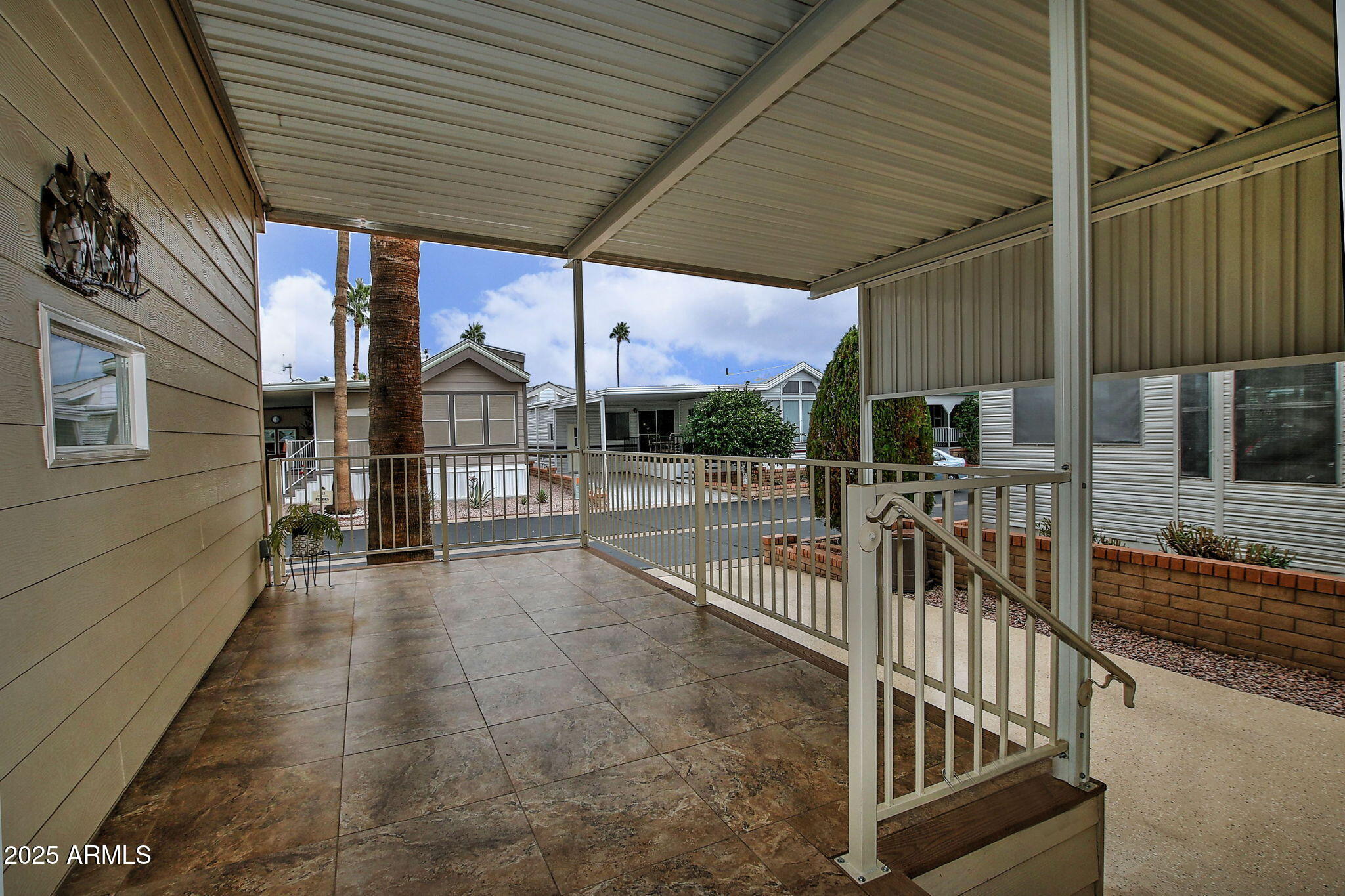 111 South Greenfield Road, Unit 462 Mesa, AZ 85206 - Photo 23 of 34 a view of a porch with seating space