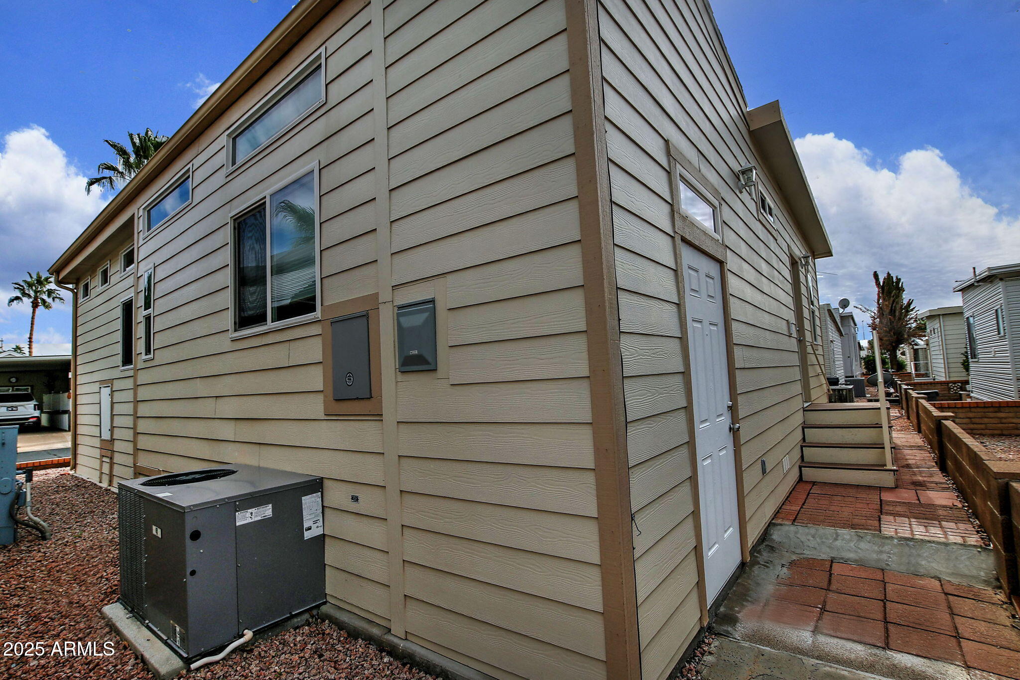 111 South Greenfield Road, Unit 462 Mesa, AZ 85206 - Photo 25 of 34 a view of a house with a door