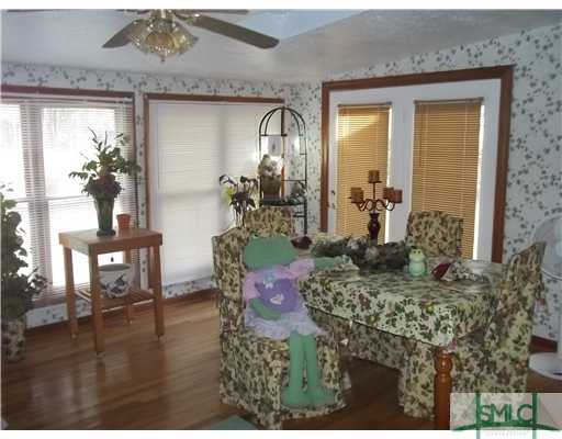 950 Old Olive Branch Road Ellabell, GA 31308 - Photo 18 of 25 Sunroom.