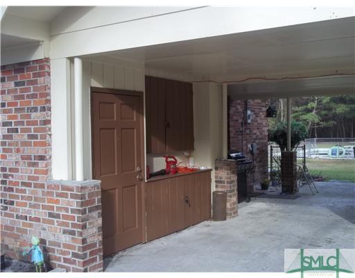 950 Old Olive Branch Road Ellabell, GA 31308 - Photo 5 of 25 Parking Lot/Garage. Carport- 2 car