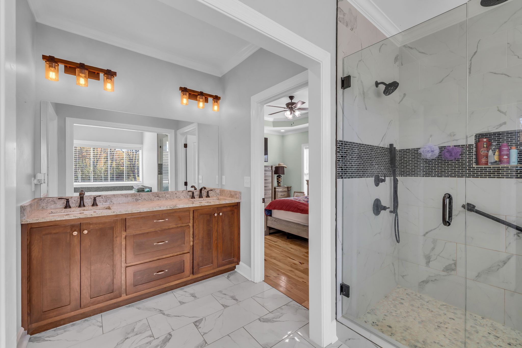 1645 Oak Grove Road Decherd, TN 37324 - Photo 17 of 46 a spacious bathroom with a tub sink and mirror