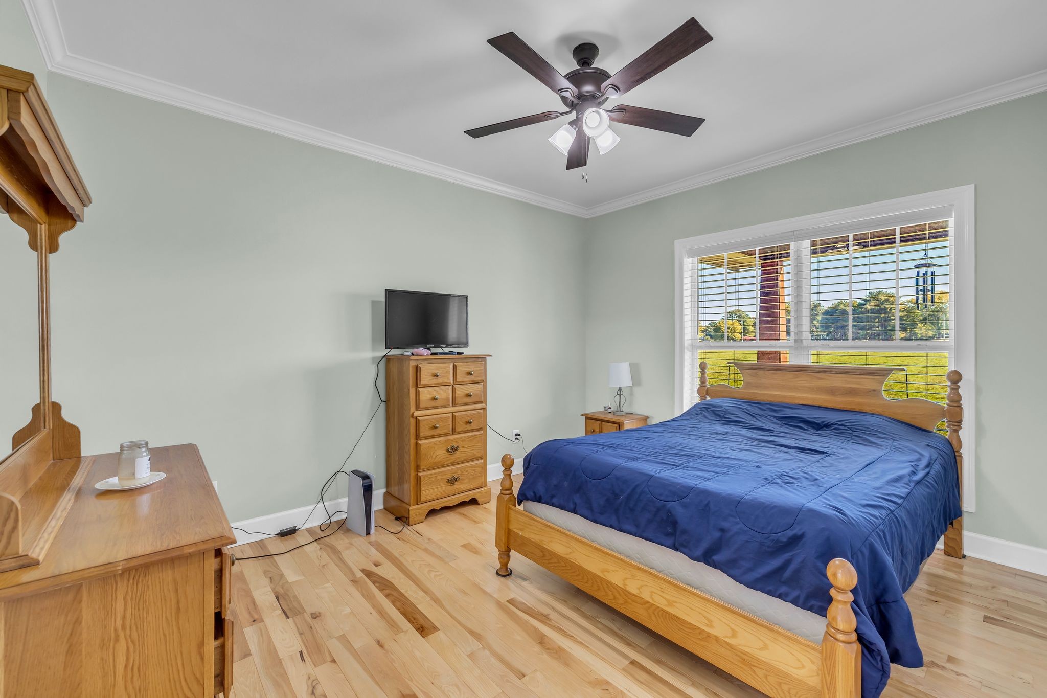 1645 Oak Grove Road Decherd, TN 37324 - Photo 19 of 46 a bed sitting in a bedroom next to a window