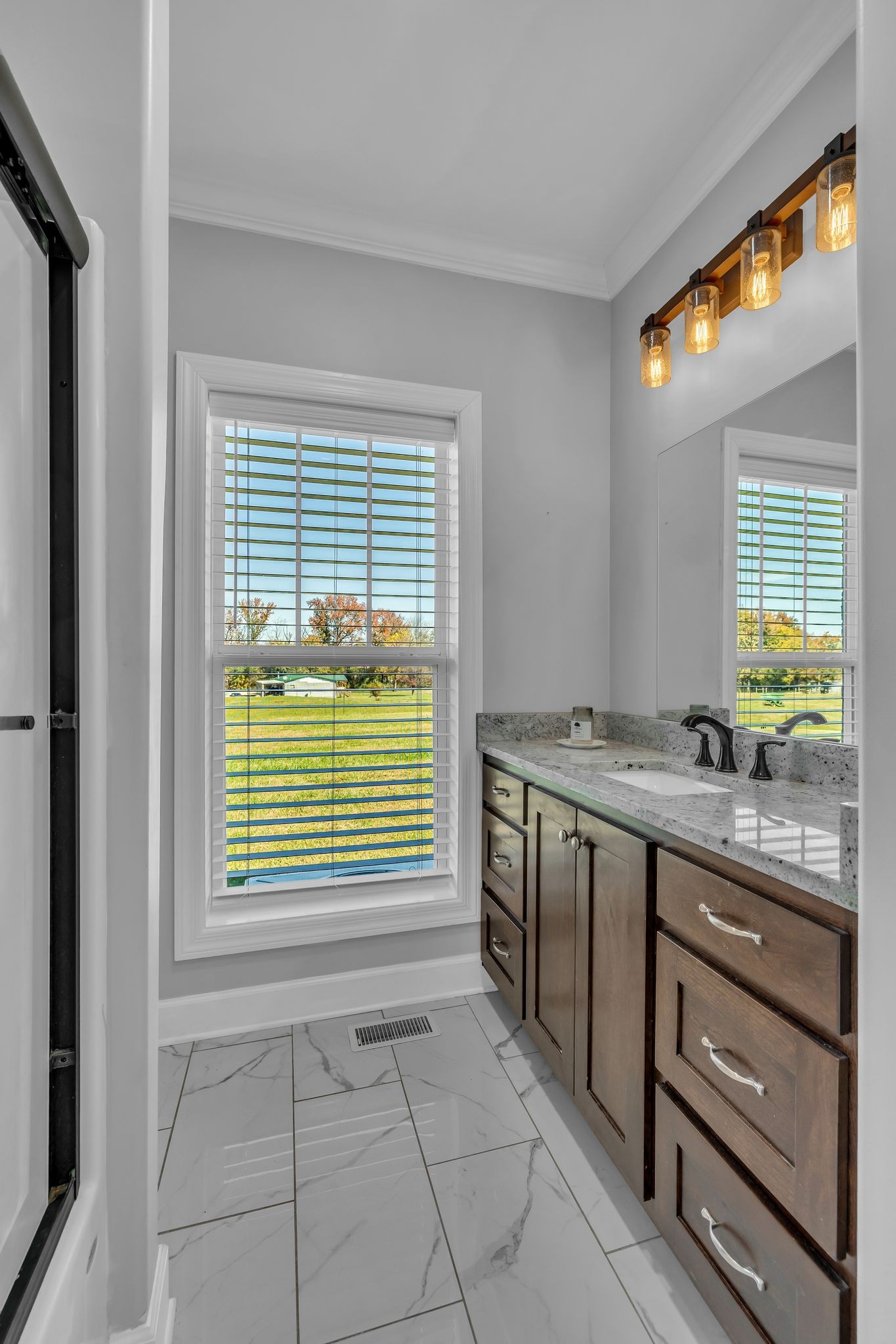 1645 Oak Grove Road Decherd, TN 37324 - Photo 21 of 46 a view of a kitchen and an empty room