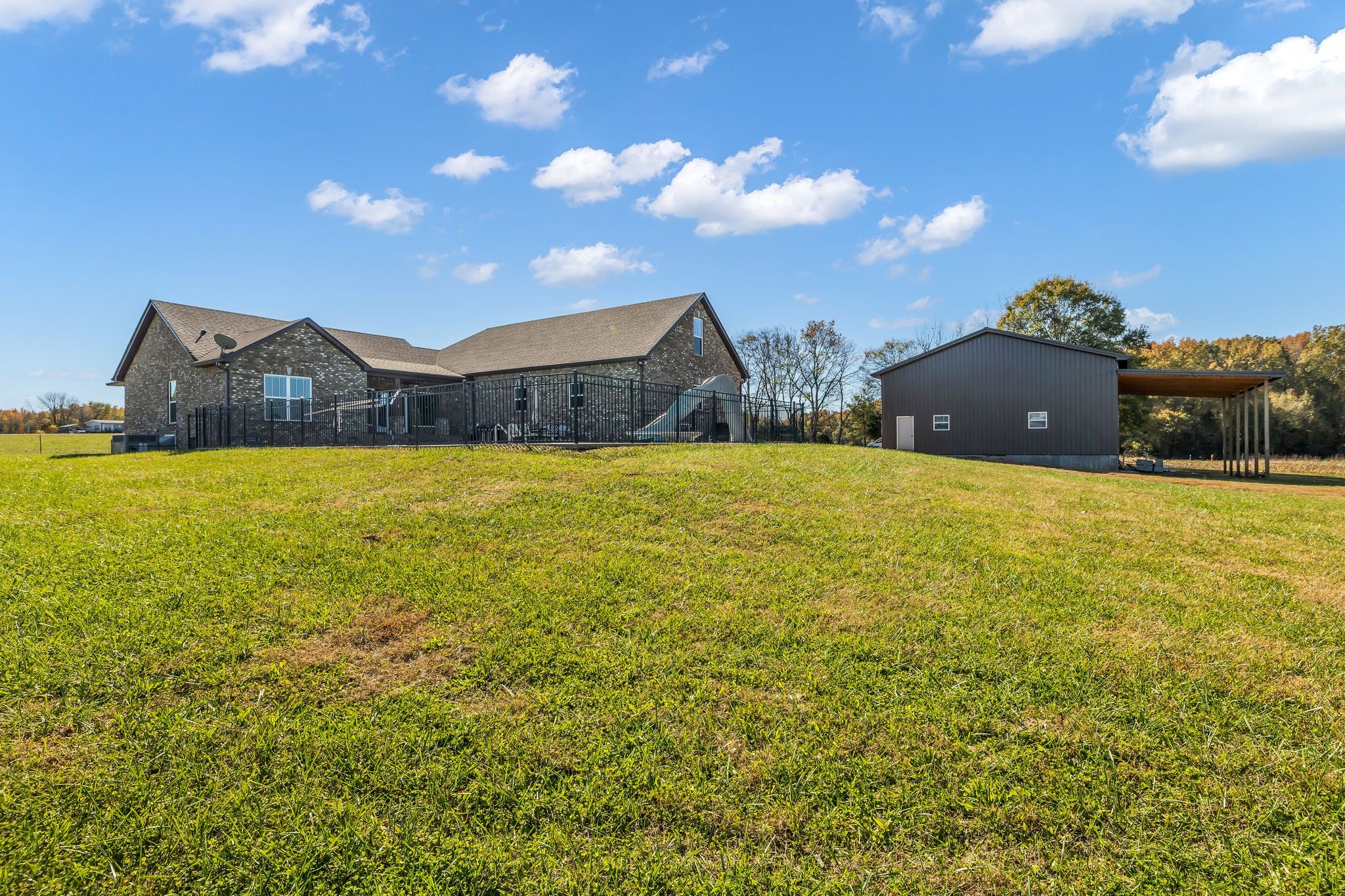 1645 Oak Grove Road Decherd, TN 37324 - Photo 31 of 46 a view of a house with a yard