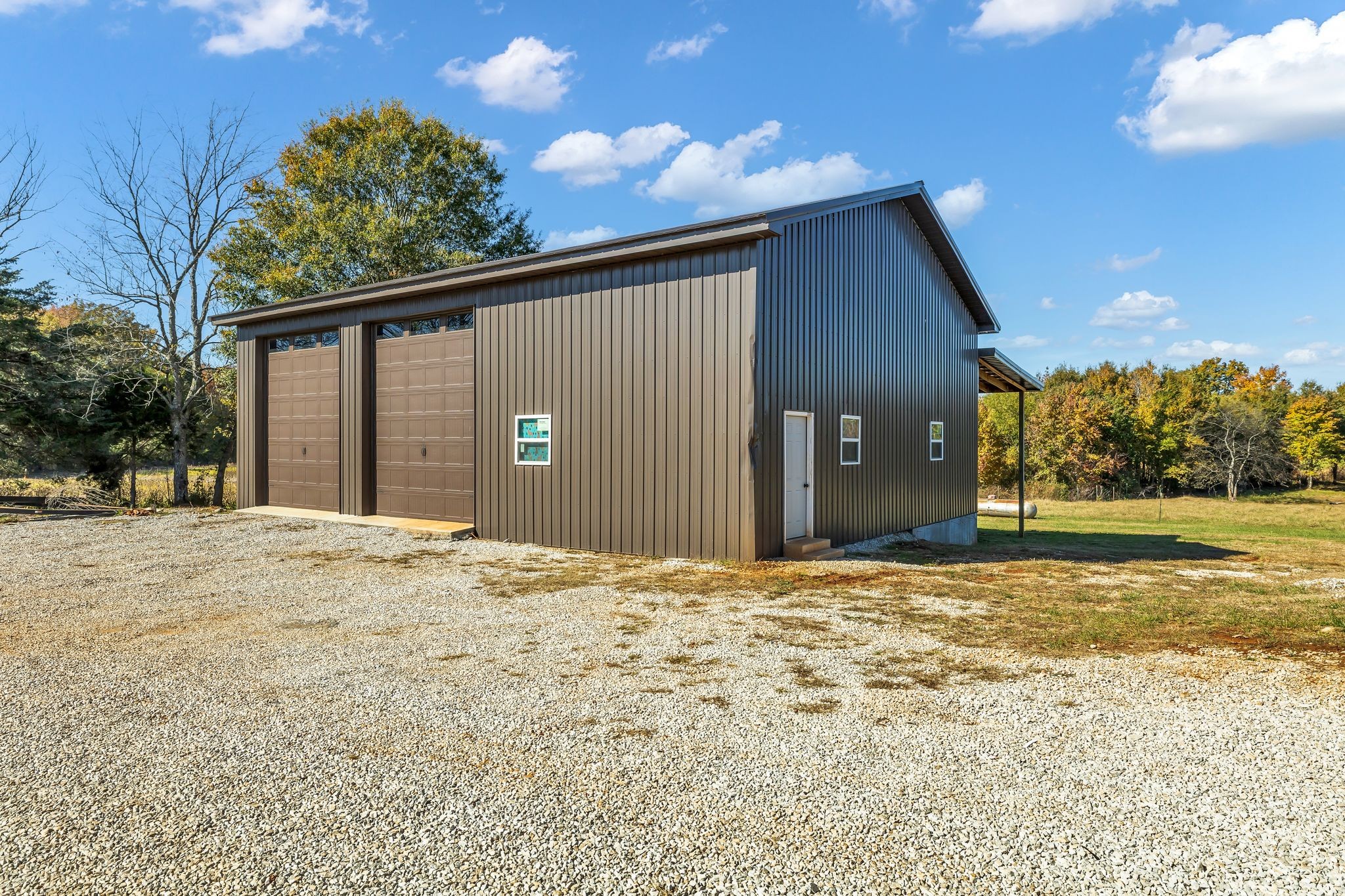 1645 Oak Grove Road Decherd, TN 37324 - Photo 35 of 46 a view of yellow house with a yard