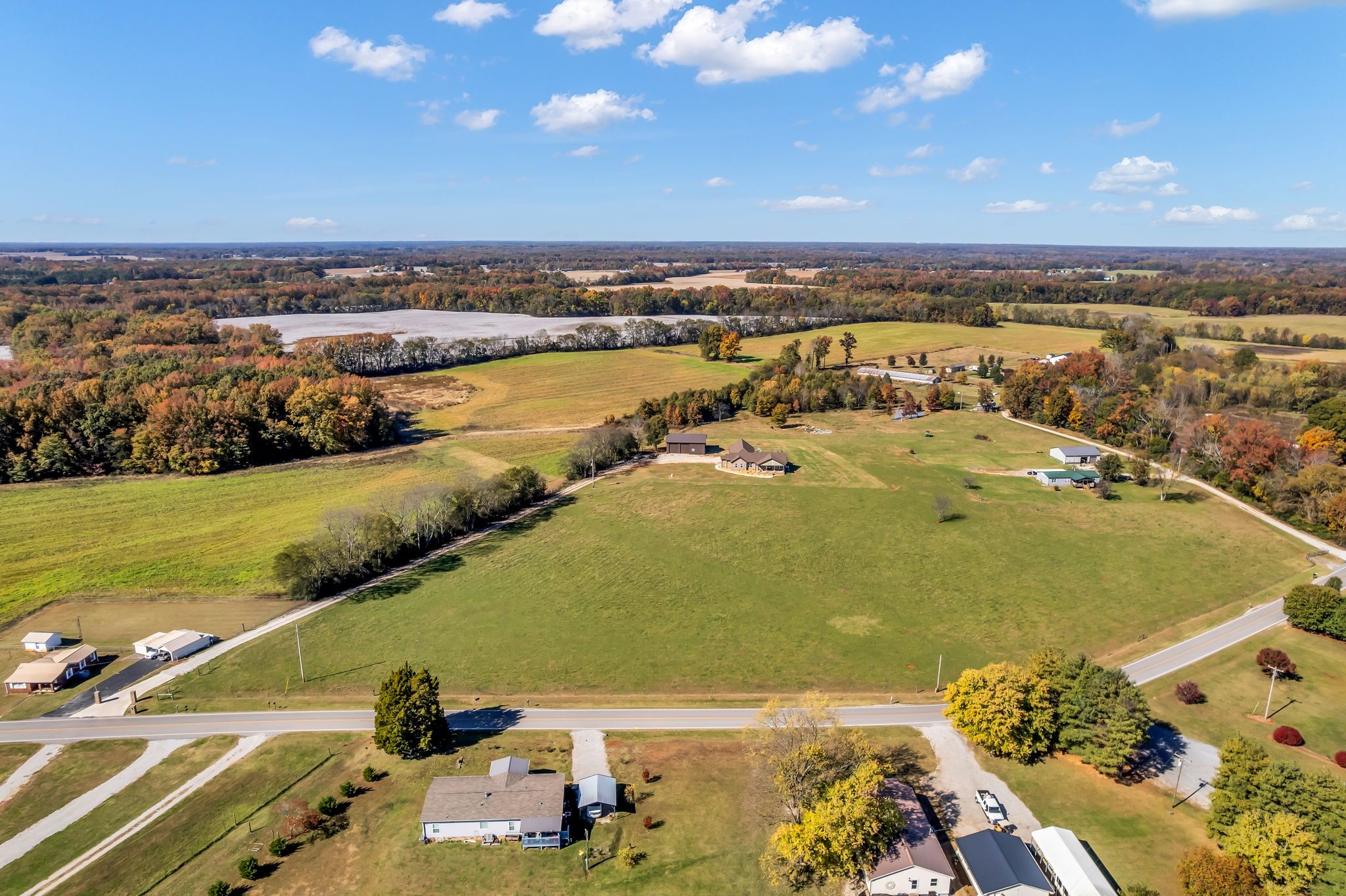 1645 Oak Grove Road Decherd, TN 37324 - Photo 42 of 46 an aerial view of a city with a lake view