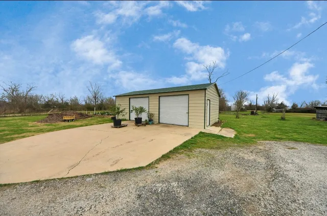 a view of a terrace with yard