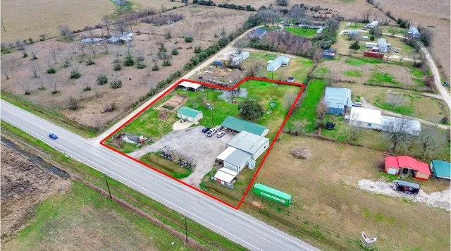 a view of a big room with table and chairs
