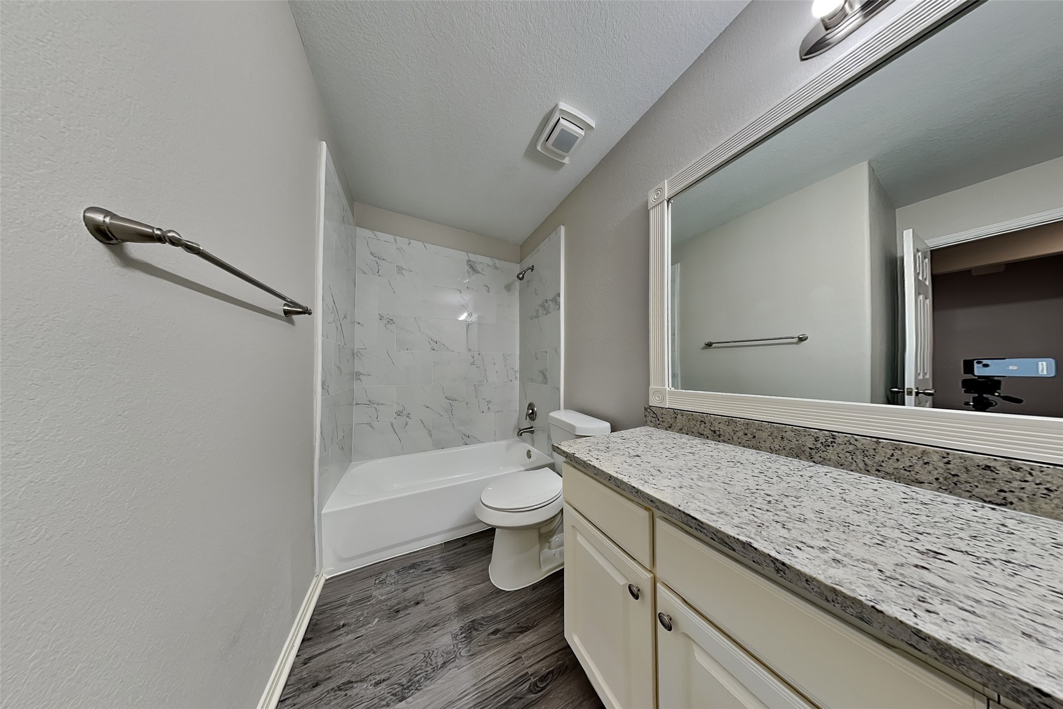 2519 Elm Crossing Trail Spring, TX 77386 - Photo 17 of 20 a bathroom with a granite countertop sink a toilet and shower