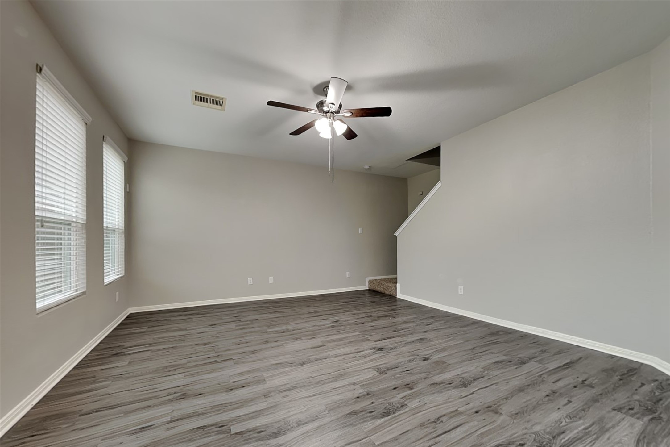 2519 Elm Crossing Trail Spring, TX 77386 - Photo 3 of 20 a view of empty room with wooden floor and fan