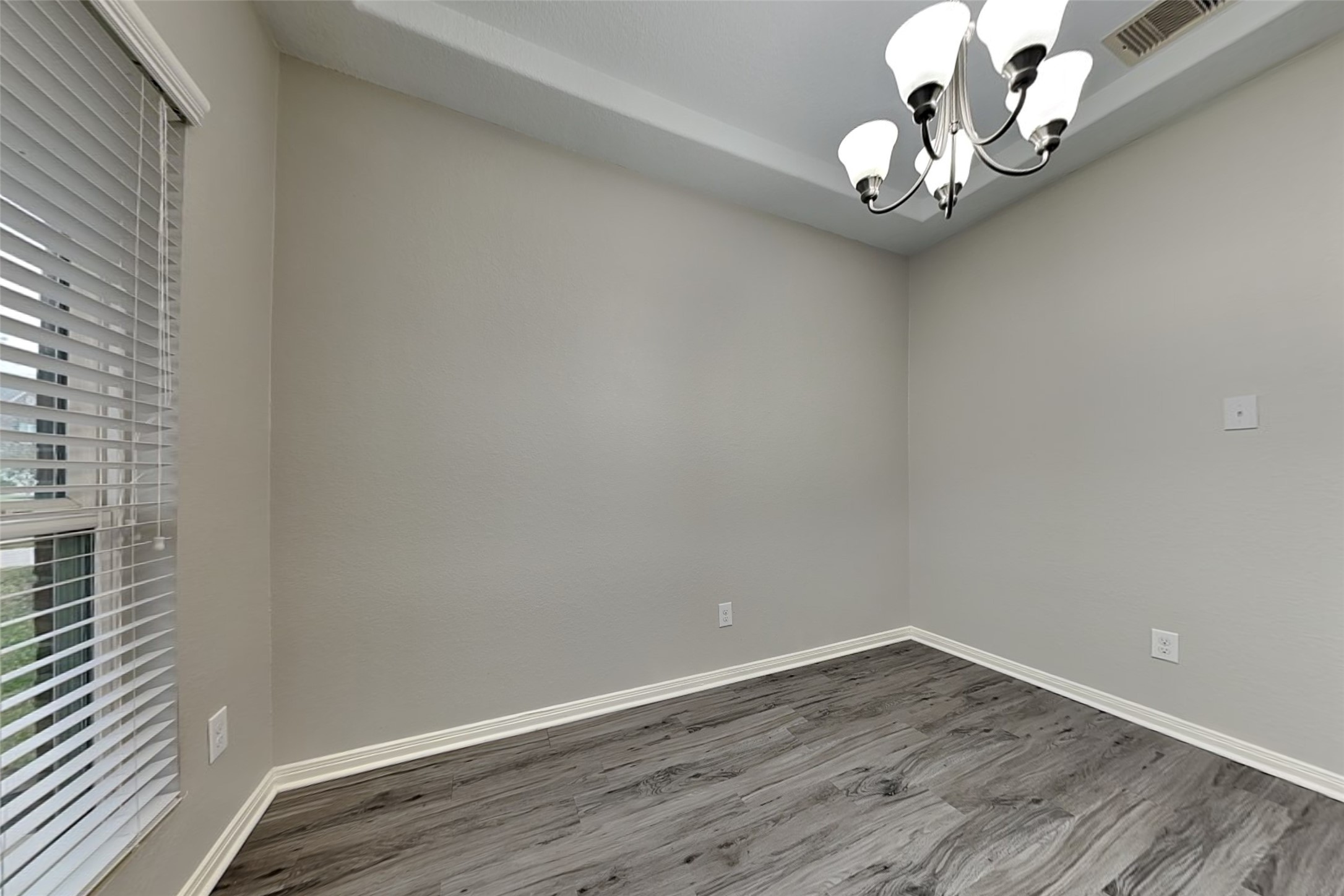 2519 Elm Crossing Trail Spring, TX 77386 - Photo 7 of 20 a view of a small space with wooden floor and a window