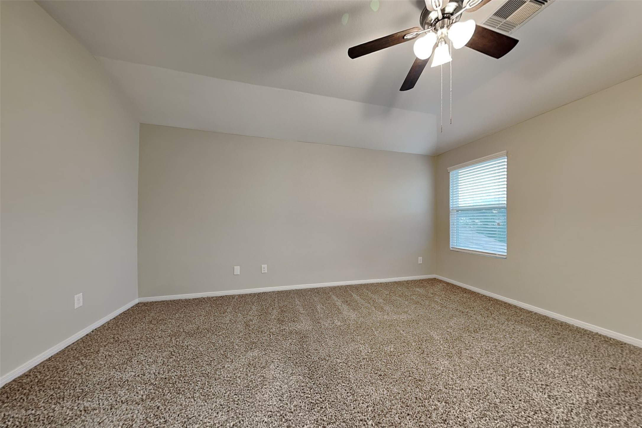 2519 Elm Crossing Trail Spring, TX 77386 - Photo 9 of 20 an empty room with a window and a fan