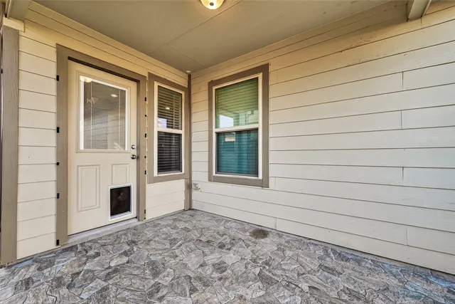 a view of a house with a large window
