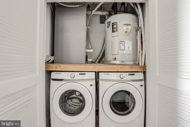 a bathroom with a washer and dryer