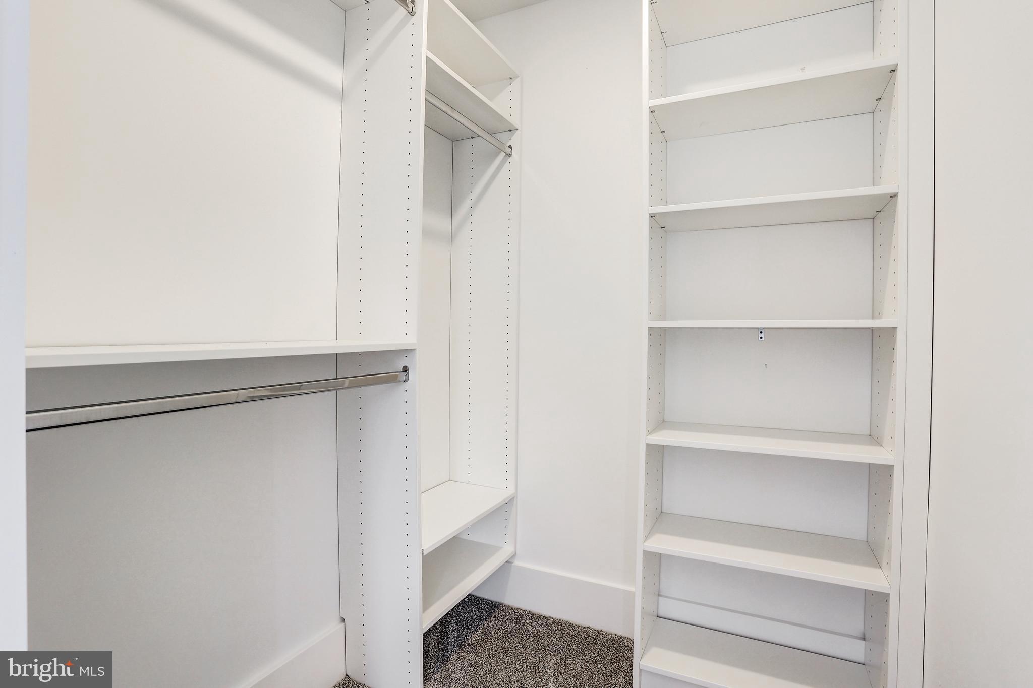 5959-63 Ridge Avenue, Unit 1BED/1BATH Philadelphia, PA 19128 - Photo 20 of 32 a view of walk in closet with empty racks
