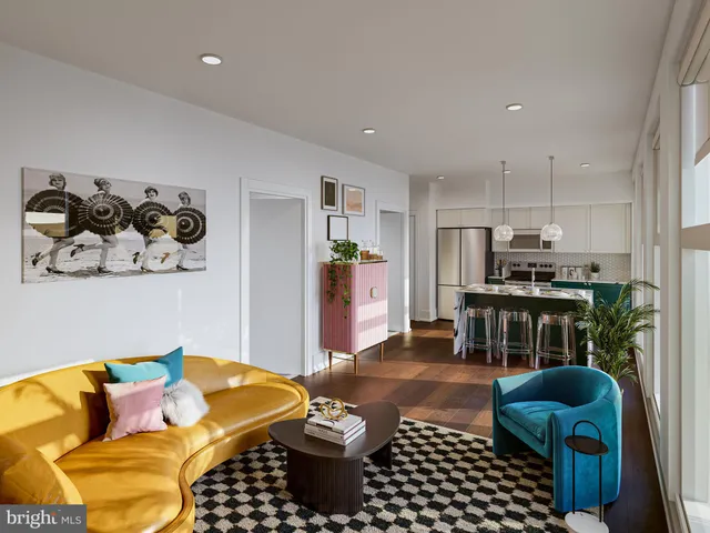 a living room with furniture and a couch