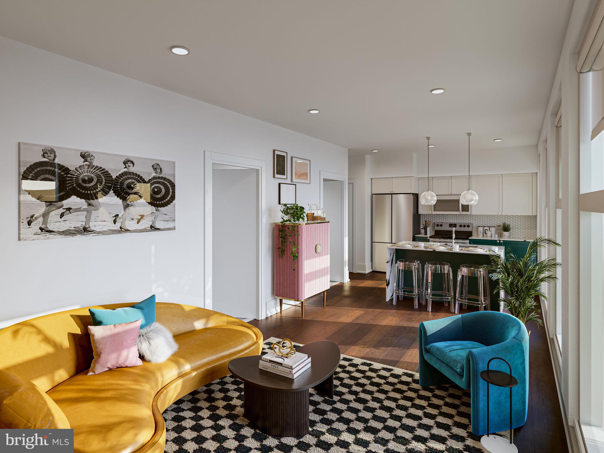 5959-63 Ridge Avenue, Unit 1BED/1BATH Philadelphia, PA 19128 - Photo 28 of 32 a living room with furniture and a couch