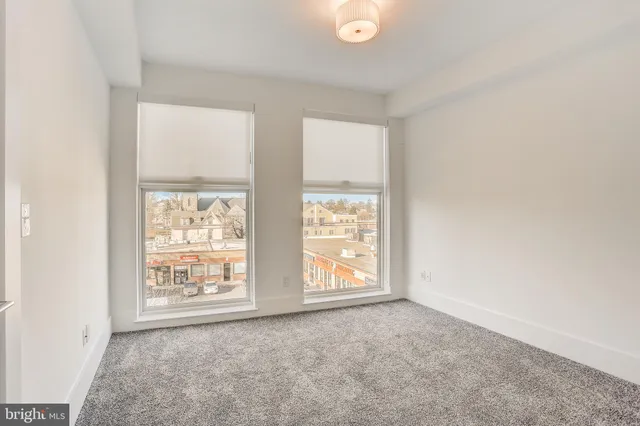 an empty room with windows