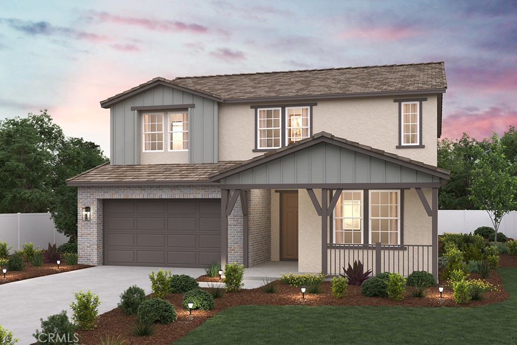 8553 Tamarack Street Chino, CA 91708 - Photo 1 of 3 a front view of a house with garden