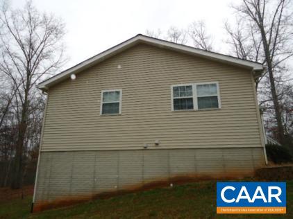 1078 Welsh Run Road Ruckersville, VA 22968 - Photo 2 of 14 a front view of a house with garage