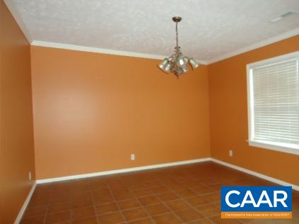 1078 Welsh Run Road Ruckersville, VA 22968 - Photo 6 of 14 a view of a room with a window and chandelier