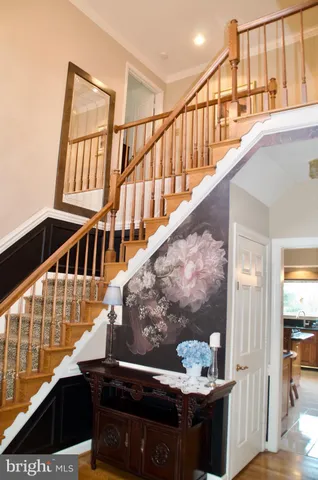 a view of a livingroom with furniture window and wooden floor
