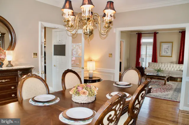 a view of a living room with furniture and a window