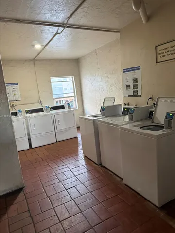 a view of wooden floor with cabinet