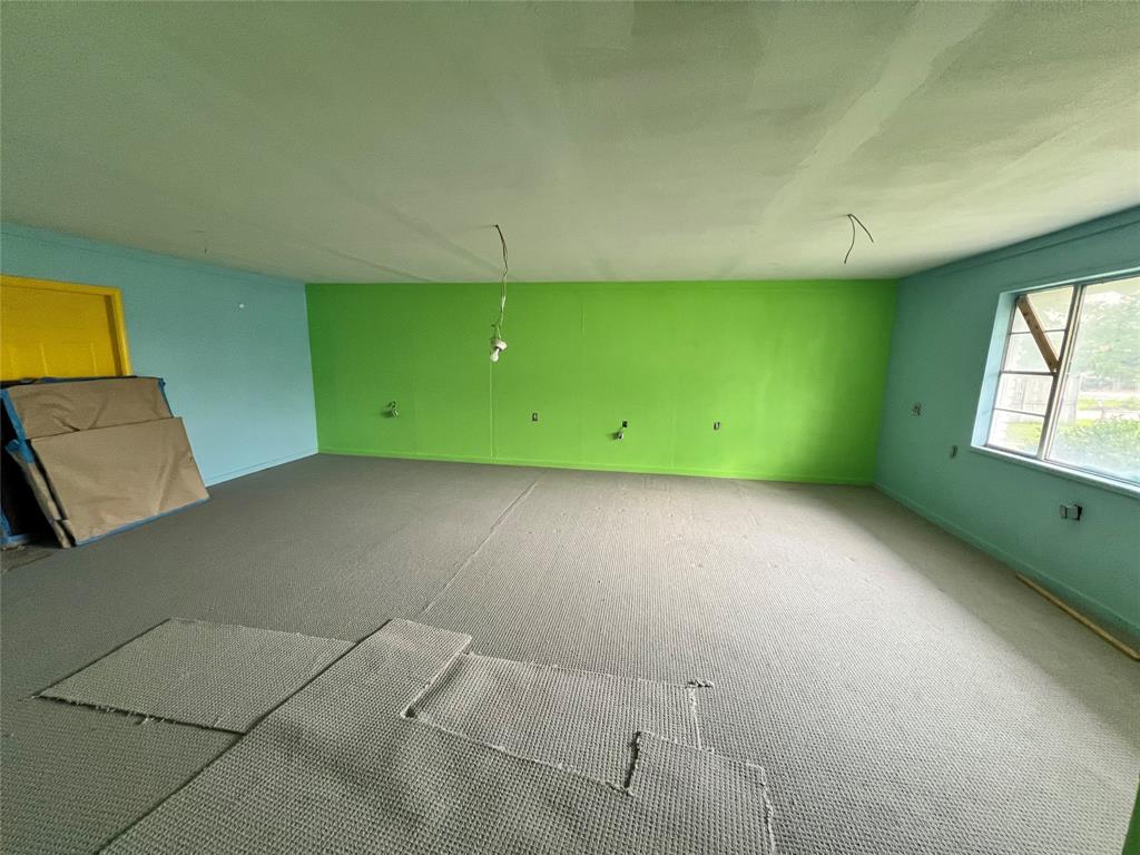 5811 Horizon Road Rockwall, TX 75032 - Photo 26 of 26 Garage enclosed room with carpet flooring
