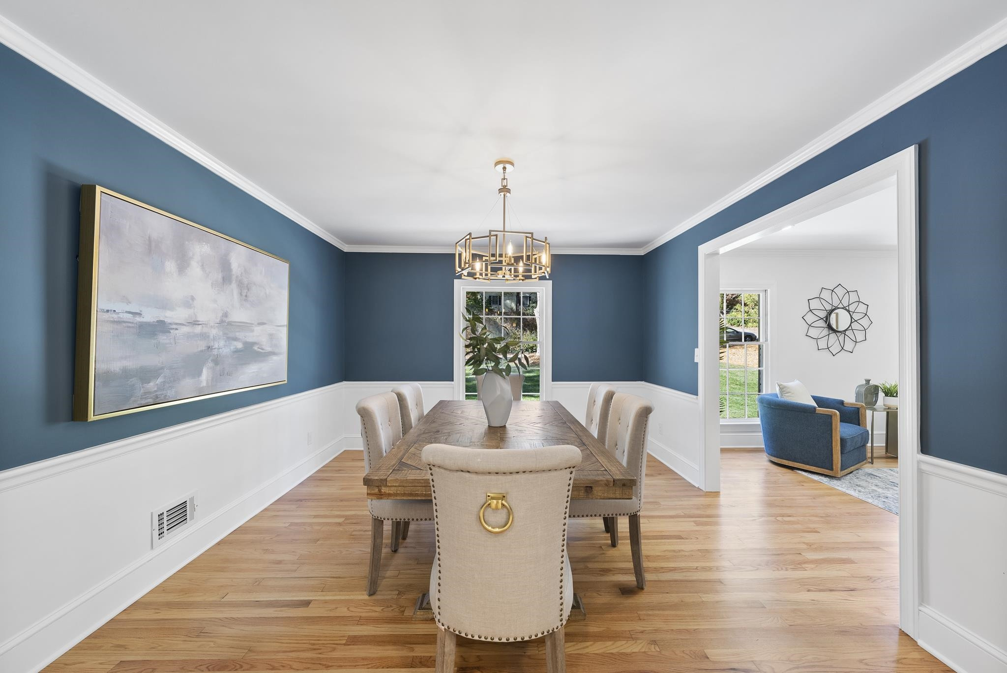 6908 Fernhill Lane Raleigh, NC 27612 - Photo 6 of 24 a view of a dining room with furniture window and wooden floor