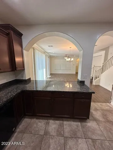 a bathroom with a sink vanity and a mirror