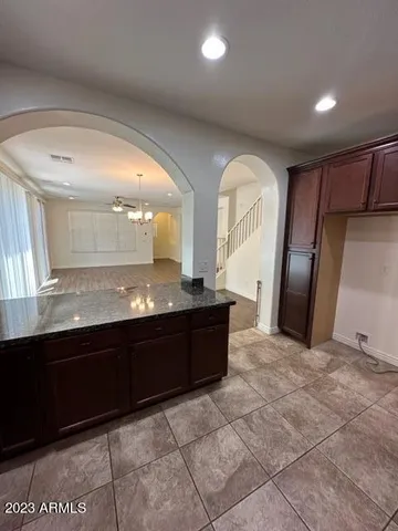 a large bathroom with a large tub and sink