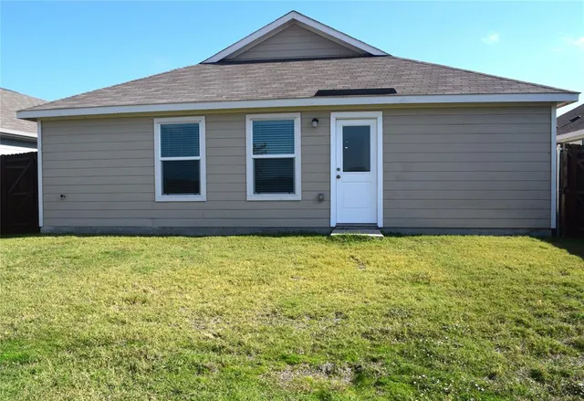 a bathroom with a sink vanity and a mirror