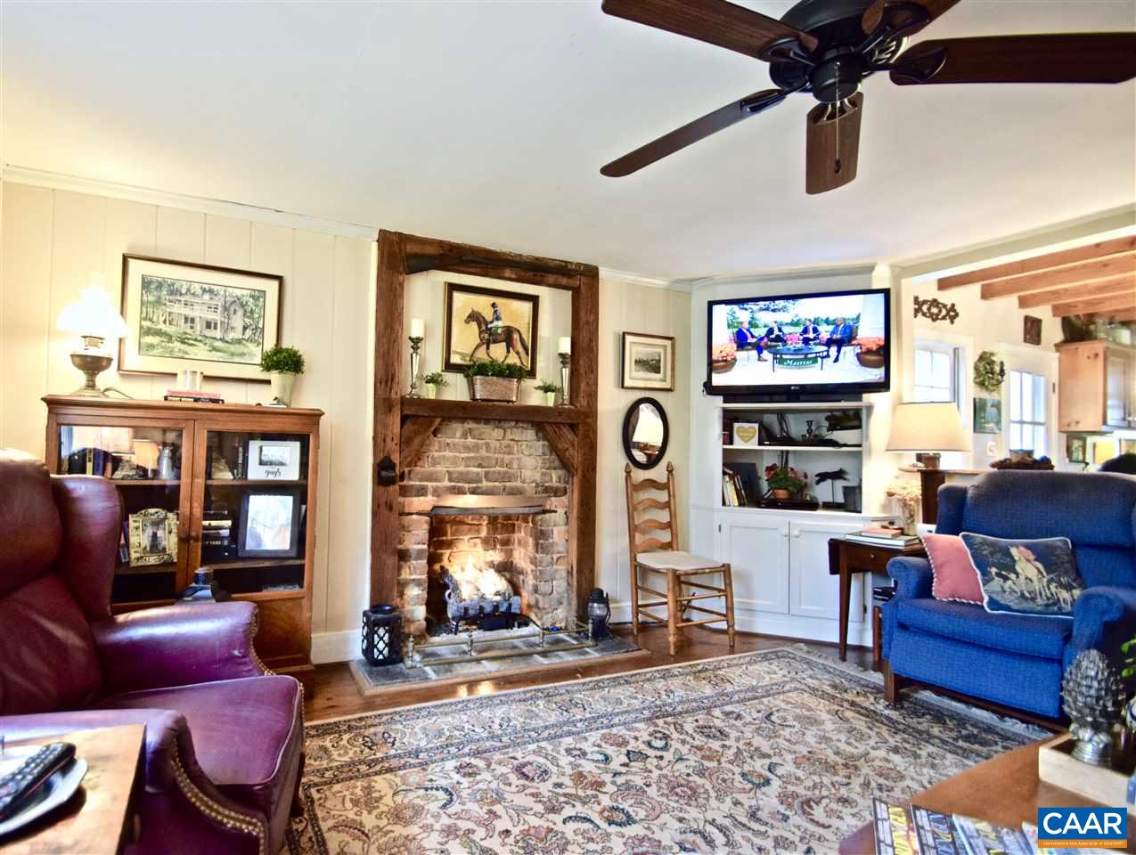 237 Campbell Road Keswick, VA 22947 - Photo 13 of 41 a living room with furniture and a fireplace