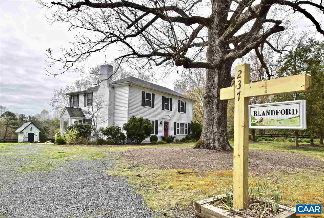 237 Campbell Road Keswick, VA 22947 - Photo 2 of 41 a view of a street with a building in the background